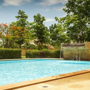 An empty swimming pool in a resort.