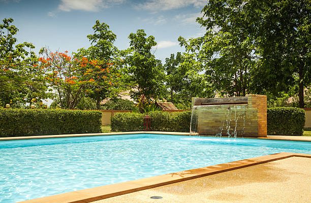 An empty swimming pool in a resort.