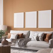 Poster frame mock-up in home interior, living room in beige and white colors