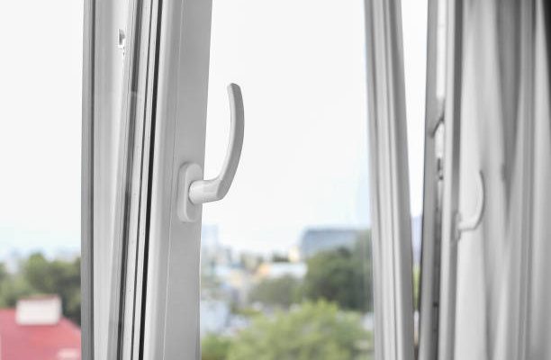 Metal-plastic windows are opened for ventilation