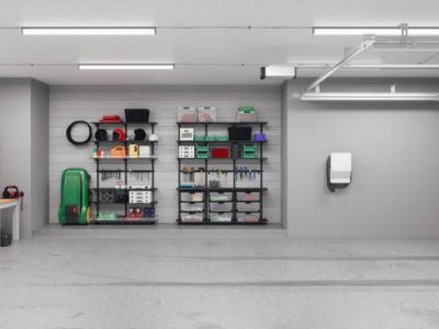 Interior of an empty modern residential garage with ev charger.