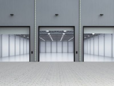 3d rendering interior empty factory with open shutter door