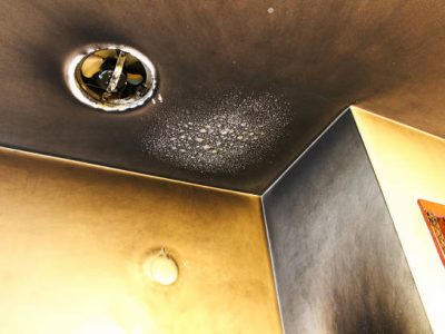 Bubbled and smoked up ceiling after a kitchen fire.