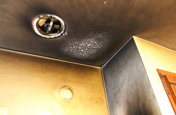 Bubbled and smoked up ceiling after a kitchen fire.