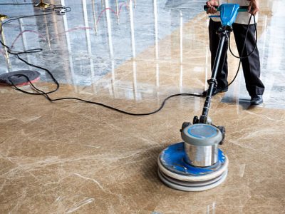People polishes floor indoors
