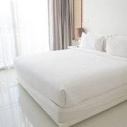 White bed sheets and pillows