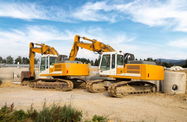 Yellow excavators on highway construction s7 near rdzawka, poland