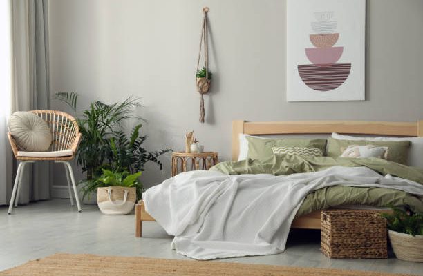 Stylish room interior with comfortable wooden bed
