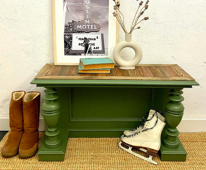 Wood color table surface combined with green table leg.