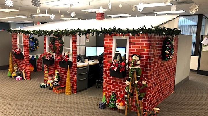 This decoration looks like a house building with Christmas touches. You can see it from the color choice which is red. 