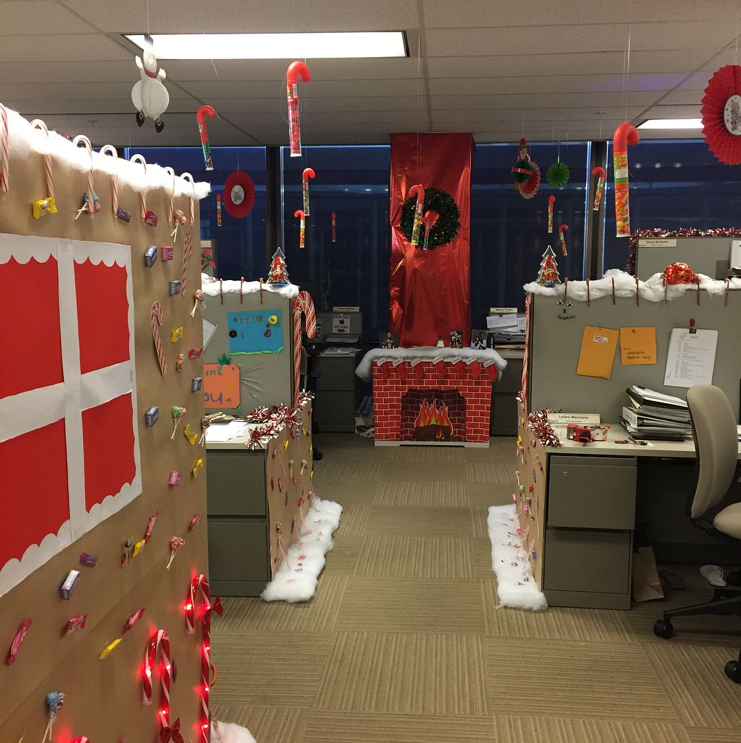 For the office, you can create a fake fireplace just to bring the warm atmosphere of Christmas. You can make it by using paper.