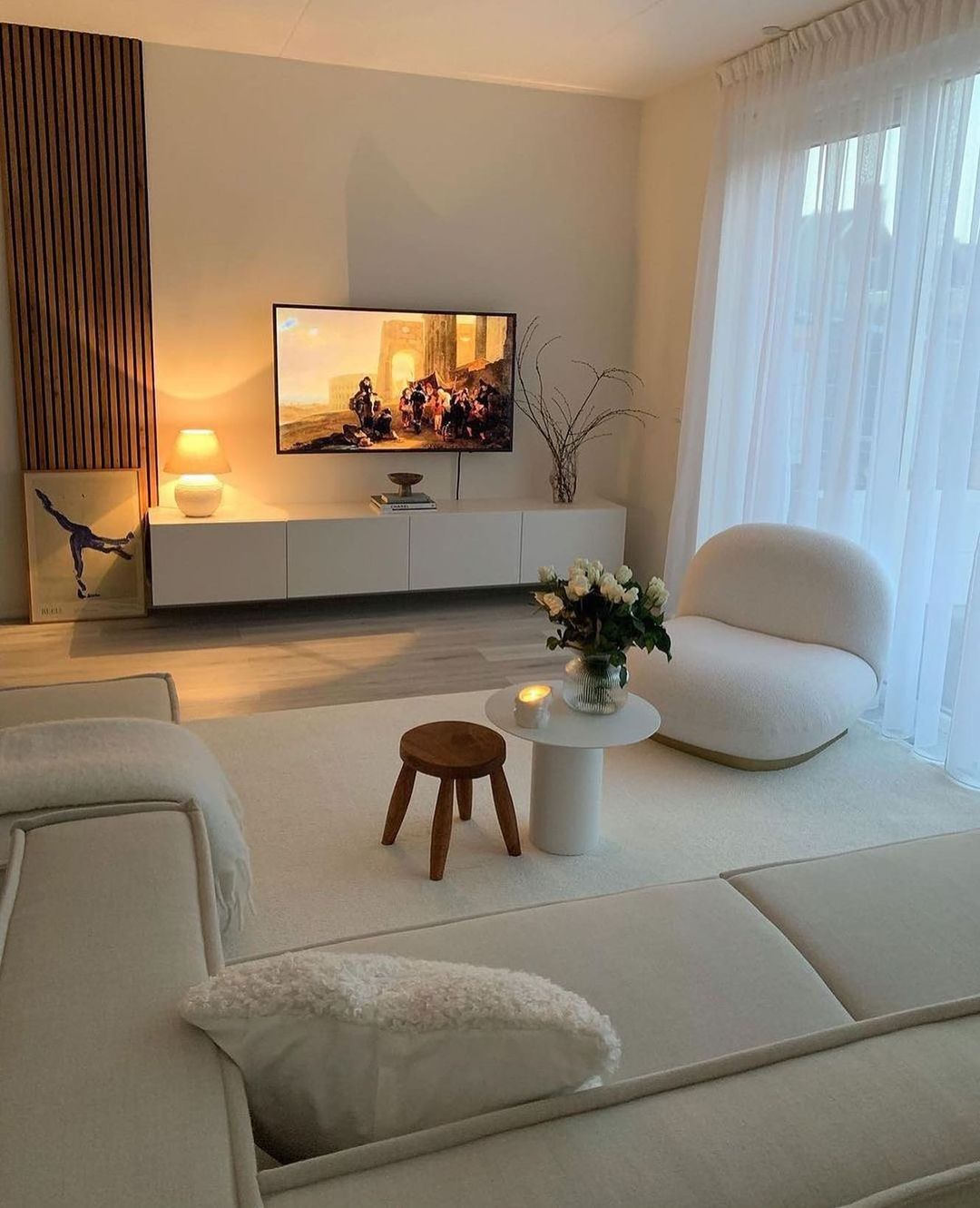 The furniture around is in a neutral clean color which is white. It has a minimum of details that make it simple.