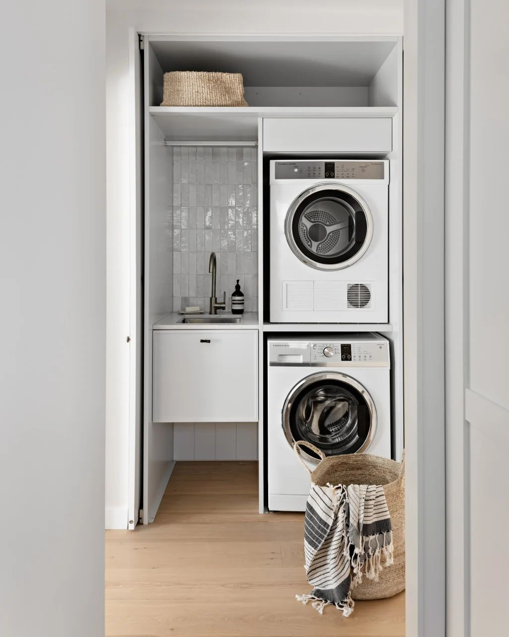 This vertical space is really narrow but look at how it can still cover all of the laundry room needs.