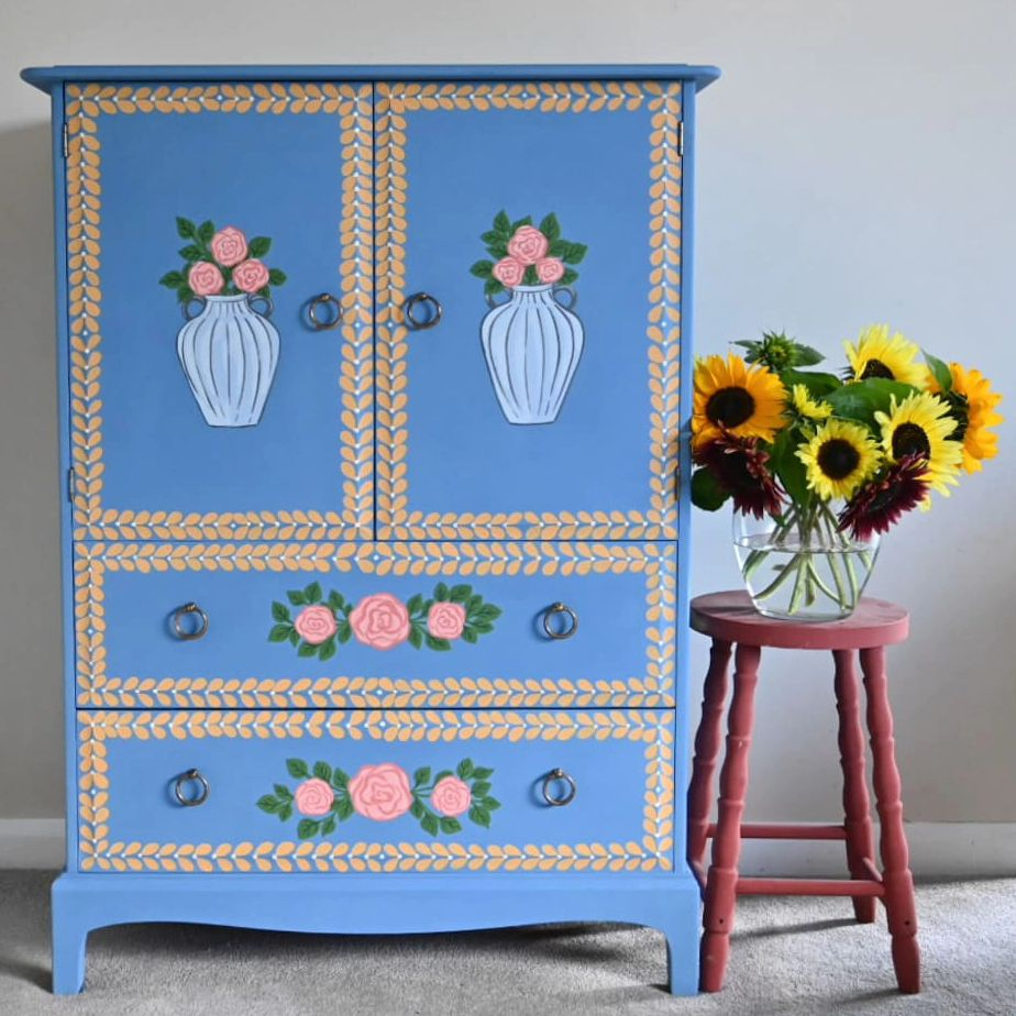 The cupboard is in blue background color with floral pattern.