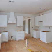 Preparing to install custom new kitchen cabinet in modern