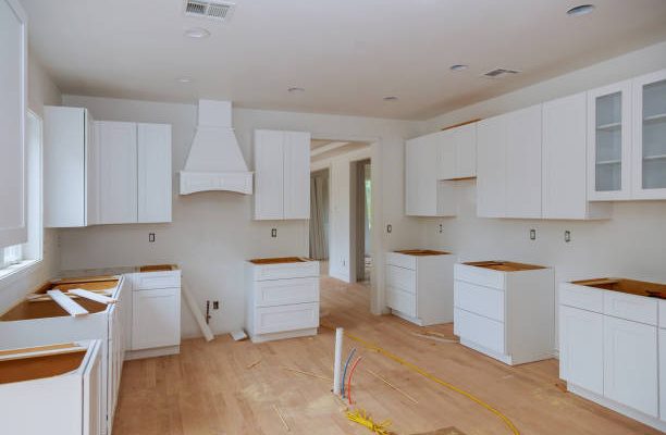 Preparing to install custom new kitchen cabinet in modern