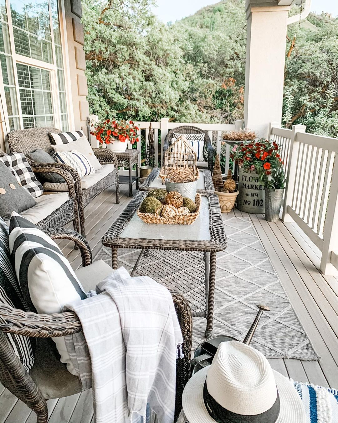 Adding cozy textiles to the cottage porch