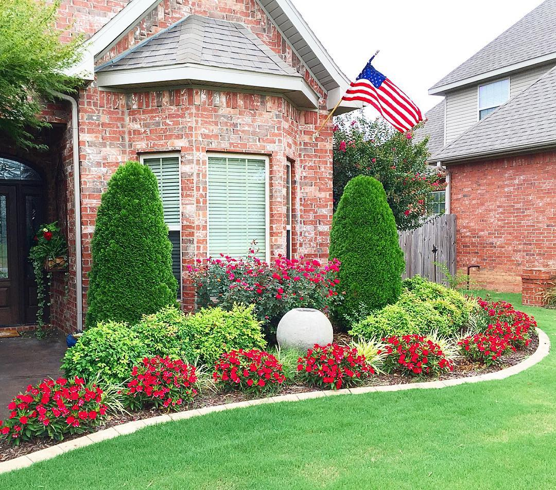 This plant and flower arrangement is integrated into a garden bed. This one is such a complete one.
