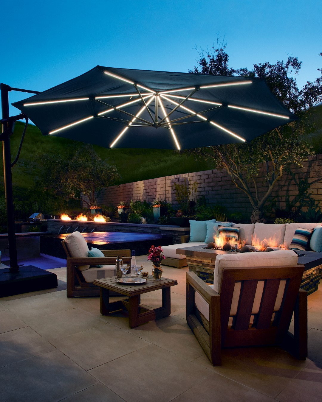 Look at how interesting this patio umbrella is! It is not only functional during the days to protect you from the sun but also to be your patio lighting.