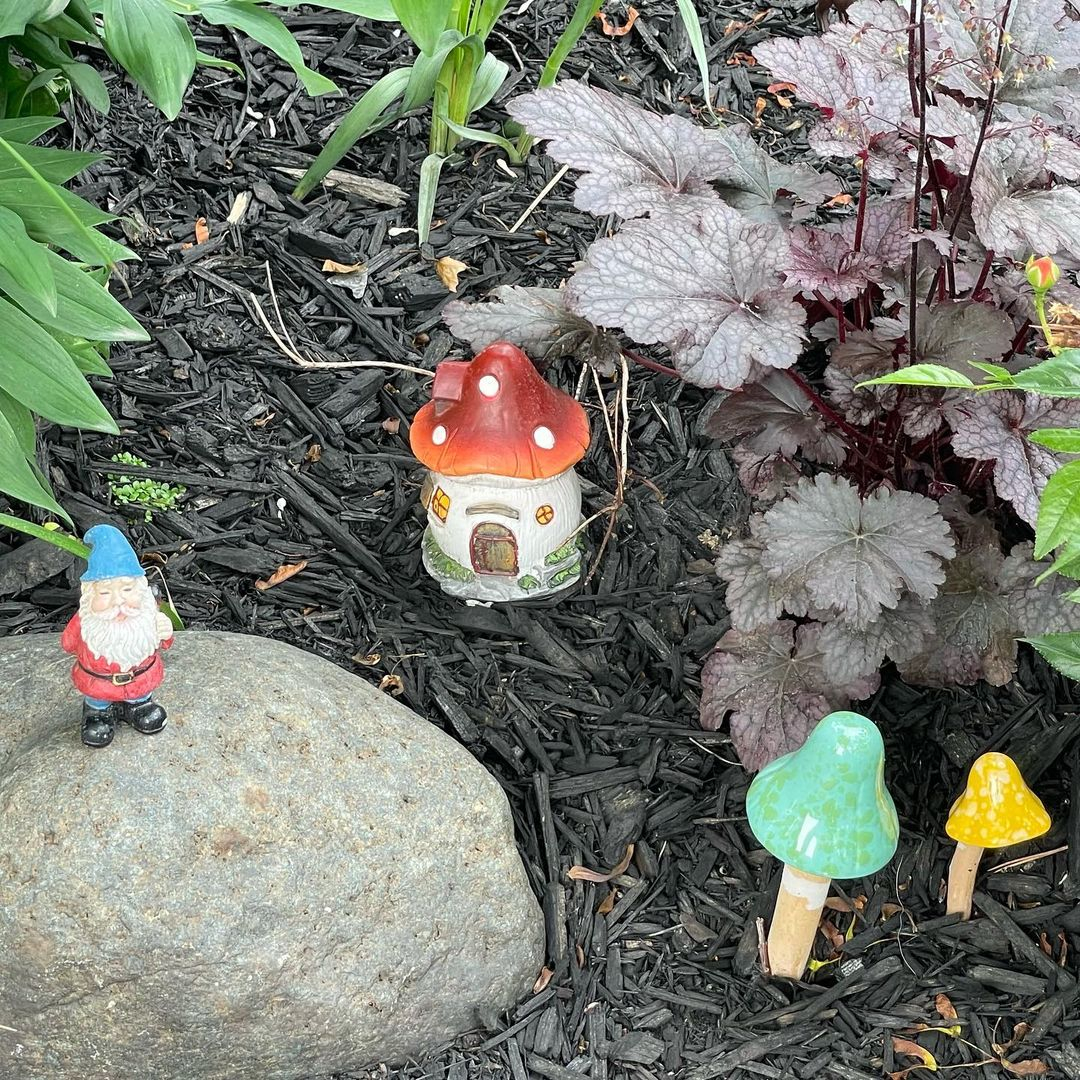 Whimsical garden gnome and mushroom