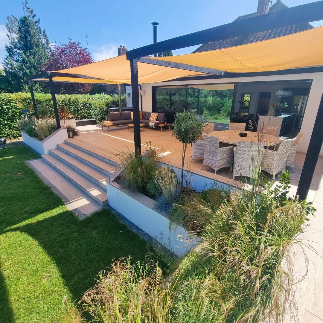 The sail shade will let you get a wide covered area on the patio. However, it won't be as easy as the umbrella to be folded.
