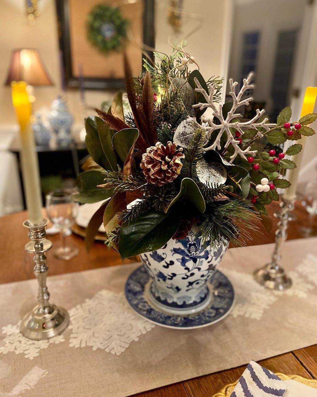 The natural touches are on the vase where there are some items that represent nature.