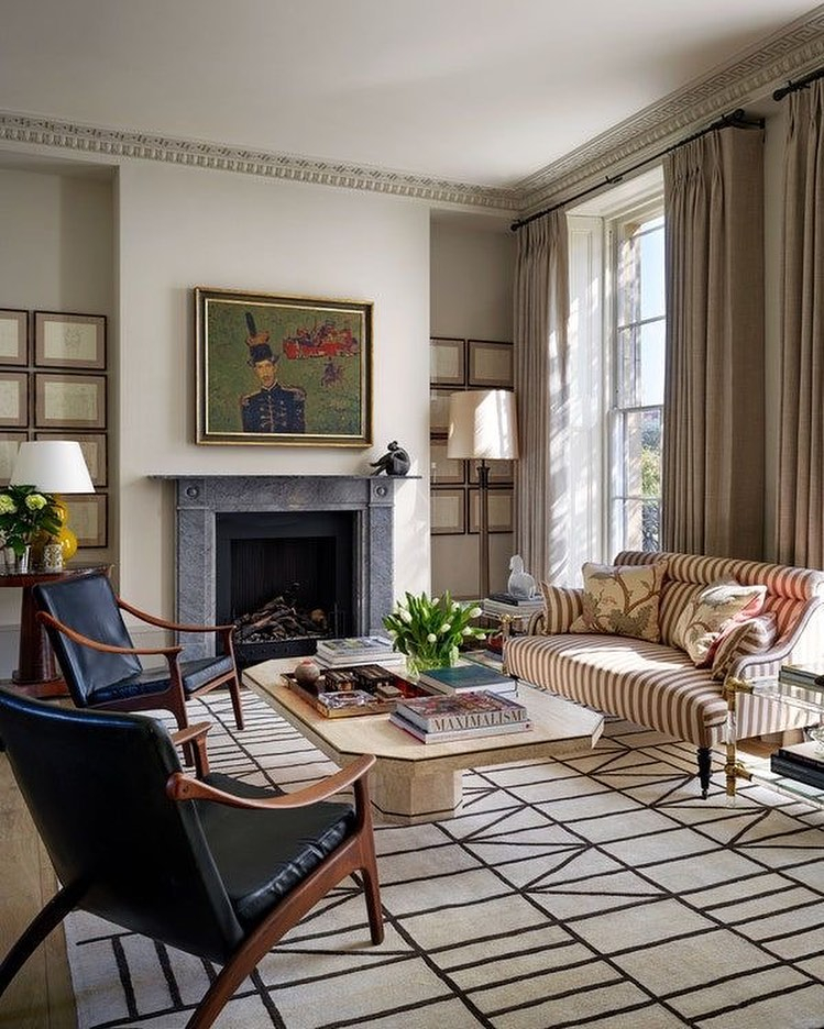 Black chairs in the neutral living rom