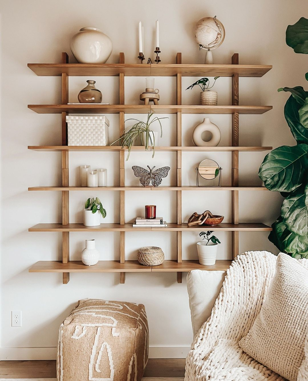 This wall-mounted storage is in the form of a wooden rack. It helps you to save the space.