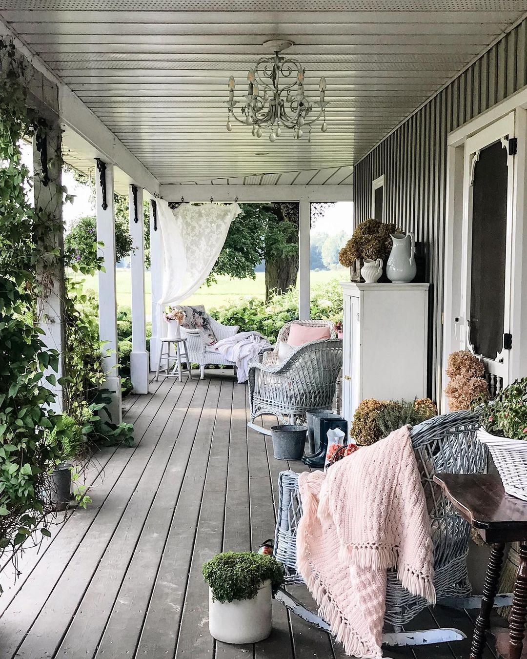 Reclaimed wood flooring for the cottage porch