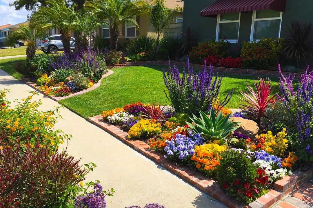 The garden beds are provided in the corners or the front yard areas. They are then used to grow plants and flowers.