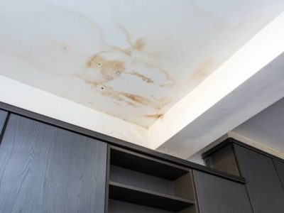 Roof leakage, water dameged ceiling roof and stain on ceiling close-up