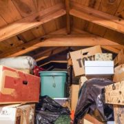 A disorganized attic. loft, or crawl-space above the residential garage.