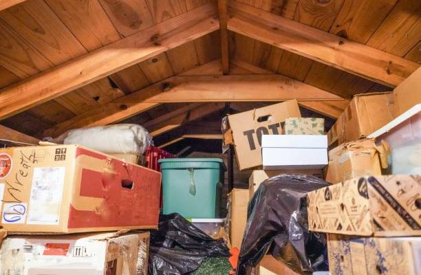 A disorganized attic. loft, or crawl-space above the residential garage.
