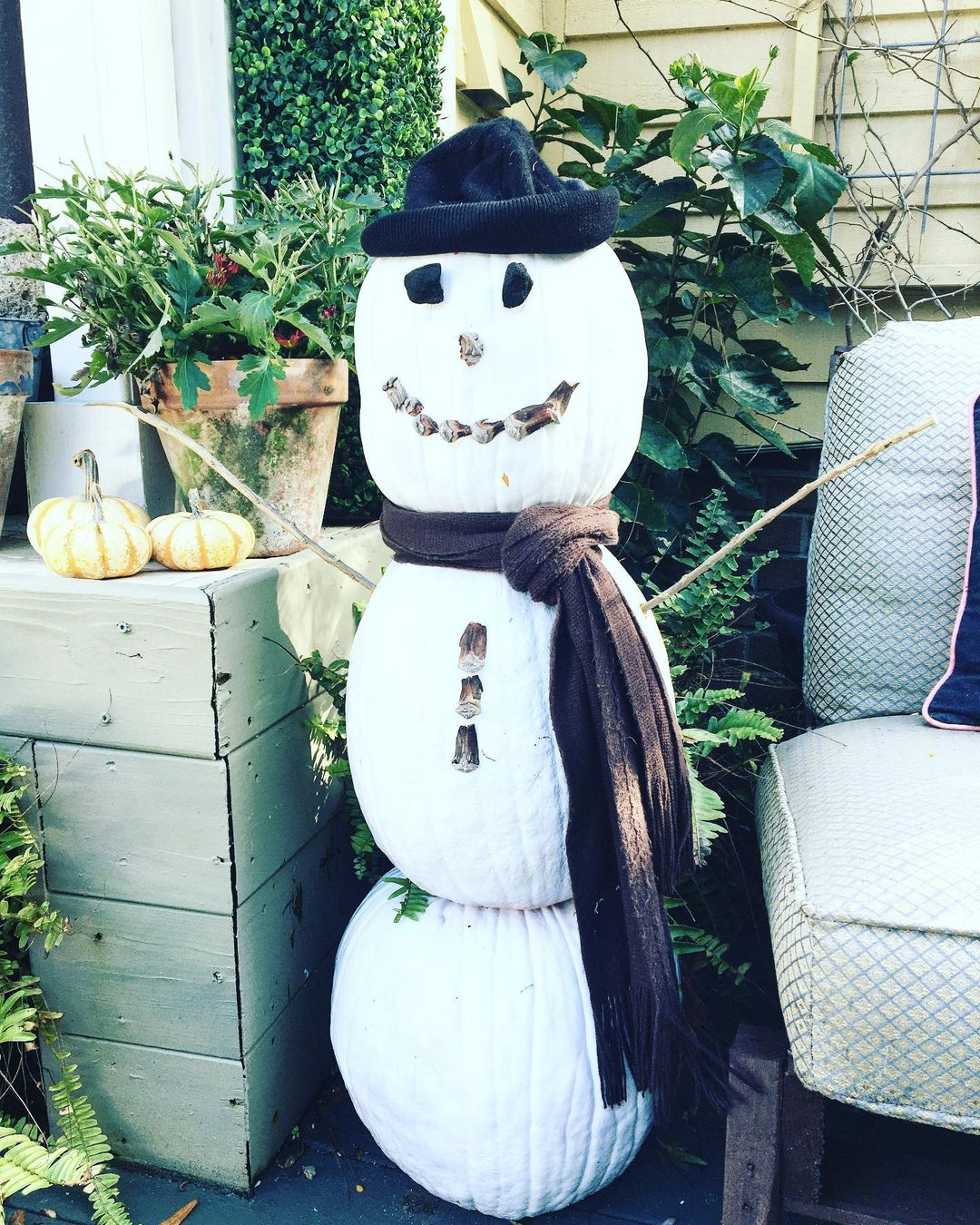 This pumpkin snowman is great with additional materials such as twigs, a beany, and a scarf. 