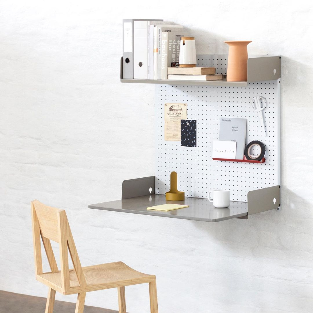 This one is not only wall-mounted but also multi-functional. It is a rack that can be used as a table at once.