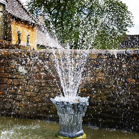 Look at how adorable this water fountain is. It can be the focal point of your garden with its massive impact.