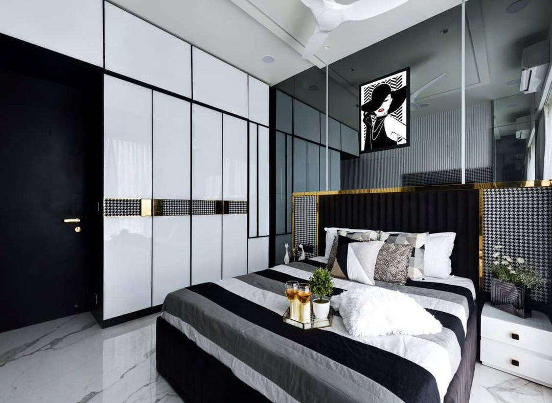 There are so many geometric accent in this bedroom. But, the most stand out is what the cushions have.