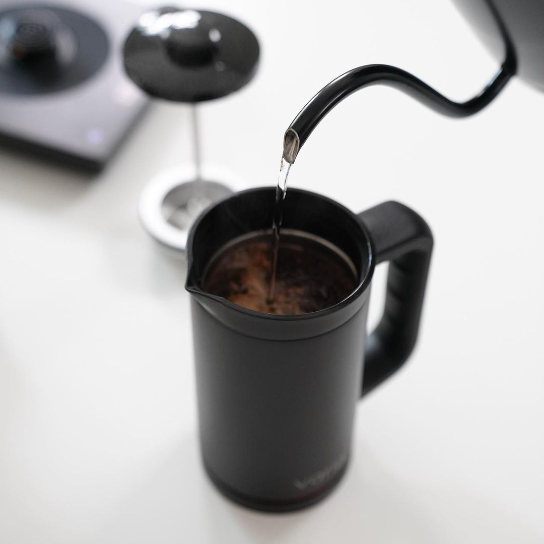 When the right grams of coffee is already filled into the coffee maker, you can then pour the water.
