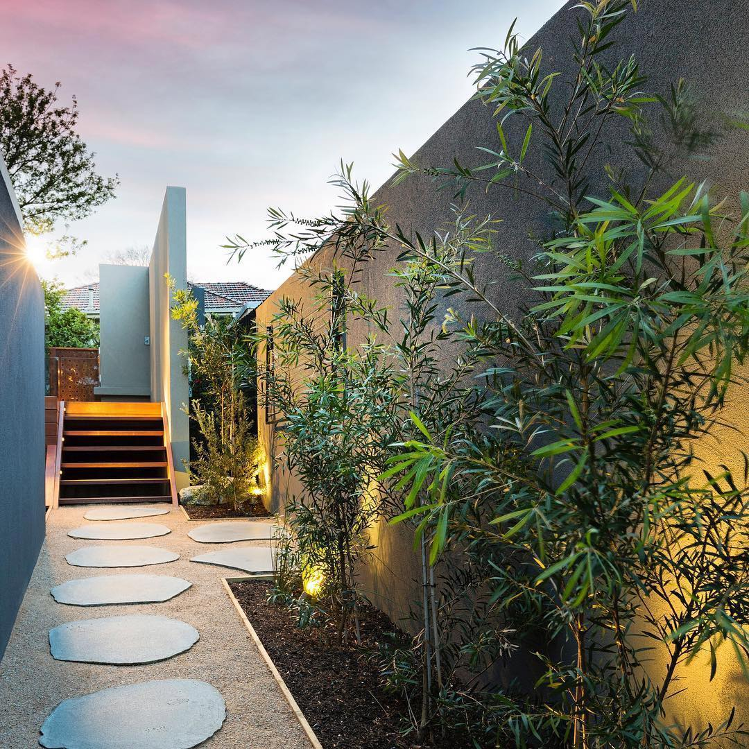 This pathway is made of natural materials which are stone and gravel.
