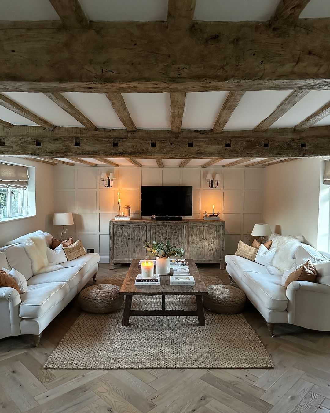 Some lighting is provided there, including the sconce, table lamp, and candles.