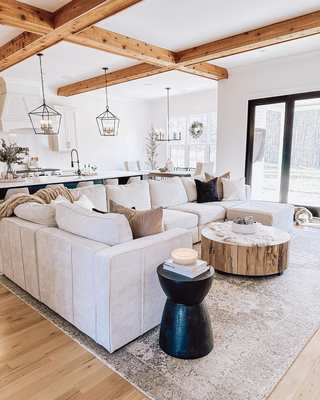 The modern aspect comes from the white and black colors that are applied in this room.