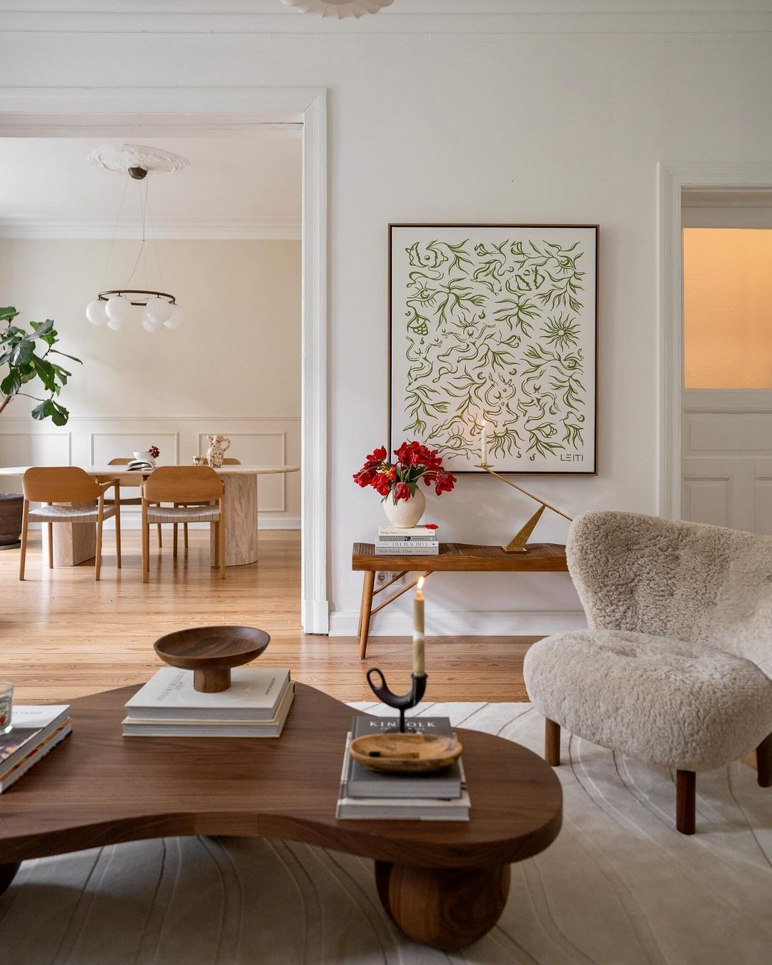 A big painting on the wall becomes the first statement in this living room. 