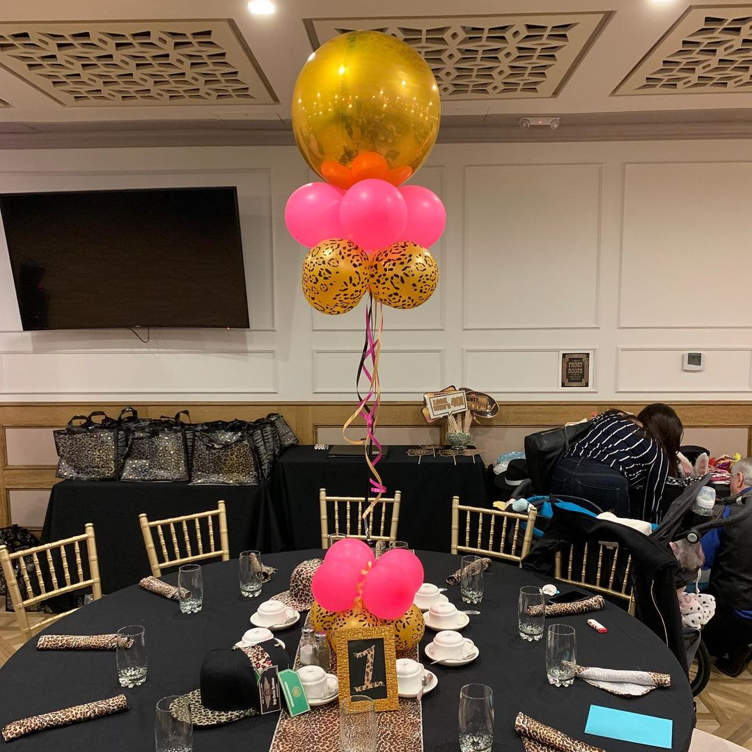 For a birthday party, you can simply use a balloon arrangement for the centerpiece.