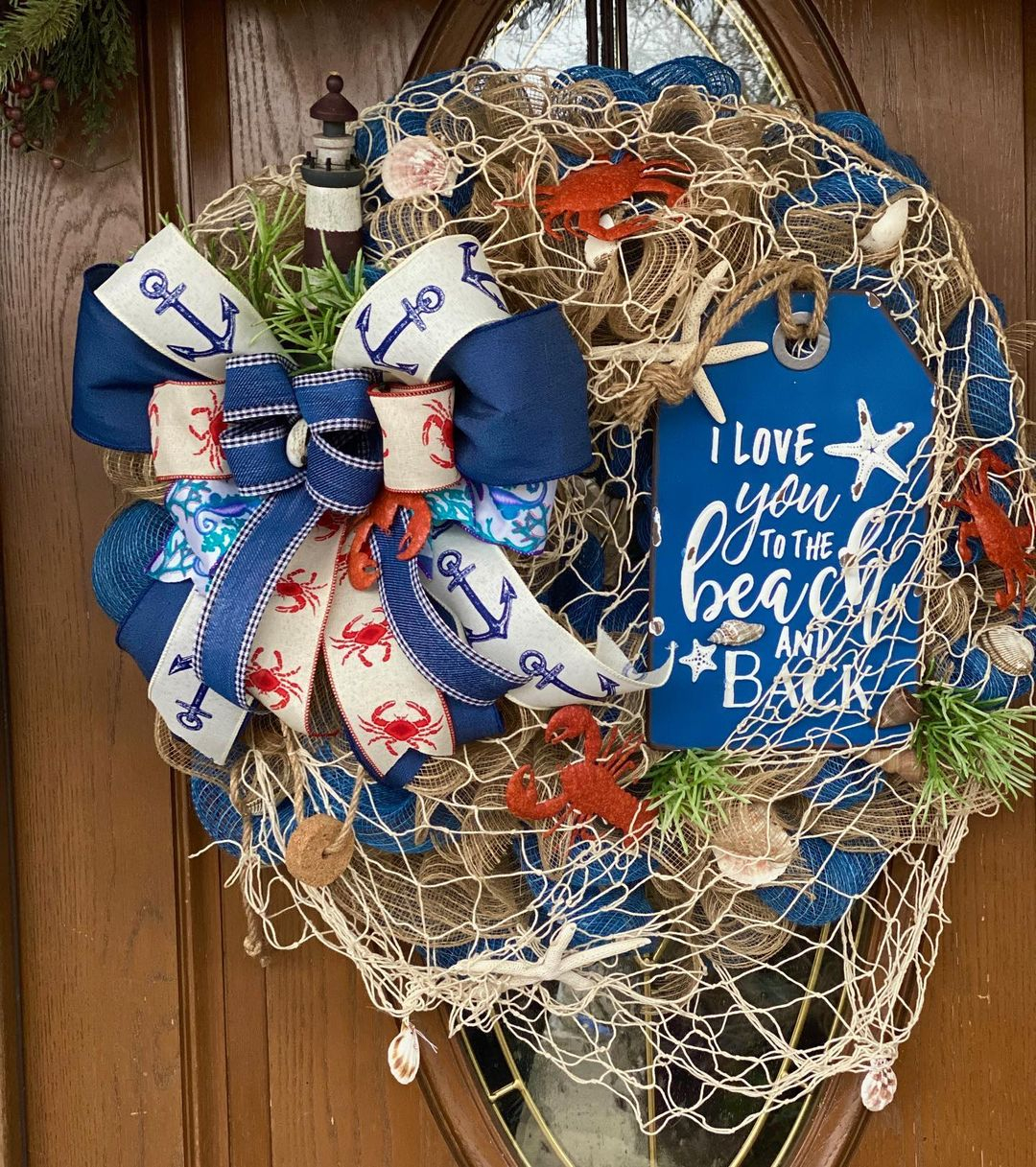 Some beach and sea items were used to create this wreath. Let's mention it! 