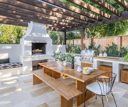 This BBQ area looks really comfortable during the summer with the sunlight exposing the BBQ area in a perfect portion.