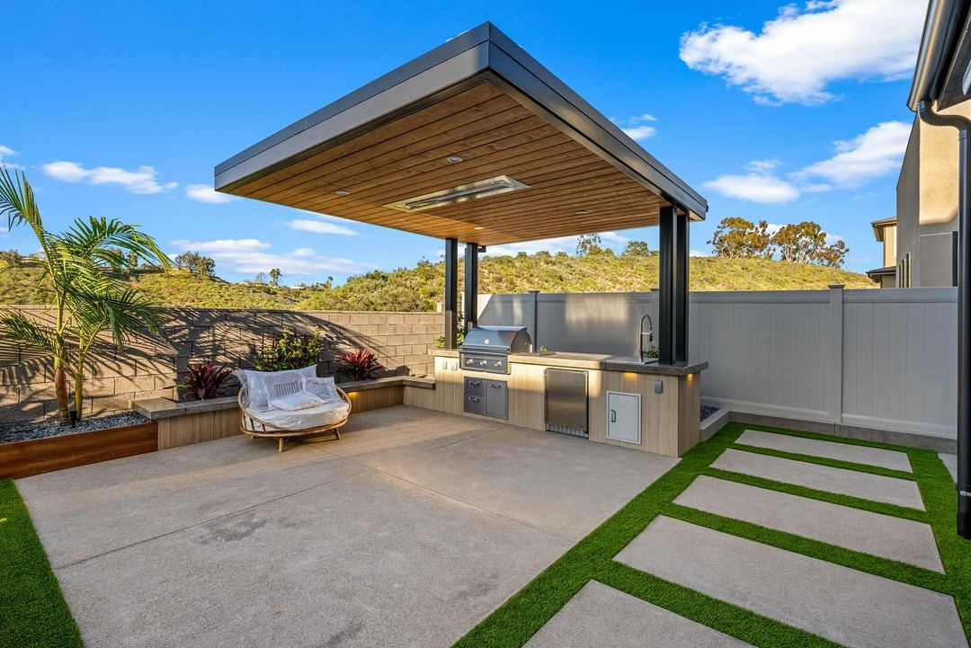 This BBQ area is located in the corner of the yard. The location is really safe with not too many pieces of flammable items.