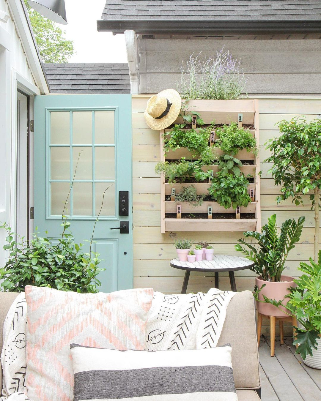 This one is the wall-mounted rack planter which is made of wood pallet material.