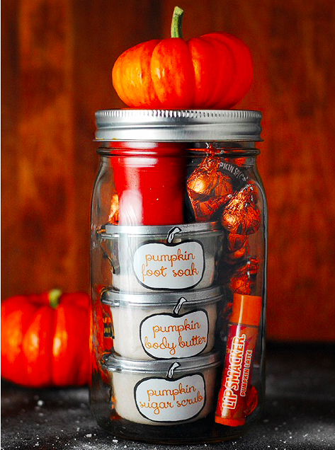 Look at how adorable this mason jar gift is. It has a fall theme with a pumpkin on the top of the jar. 