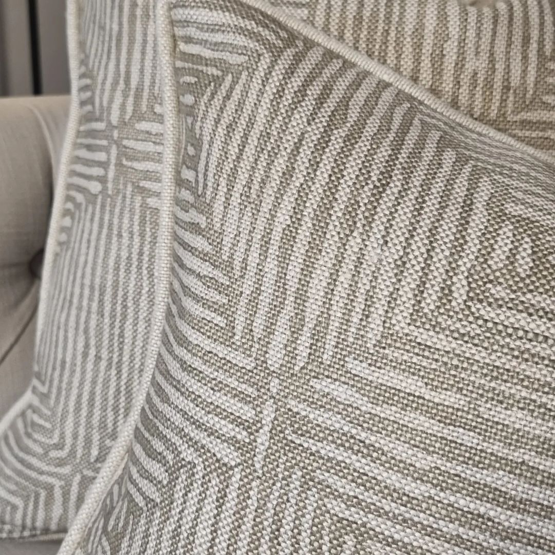 This one is the cushion in linen material. It has a texture that makes it more interesting. 