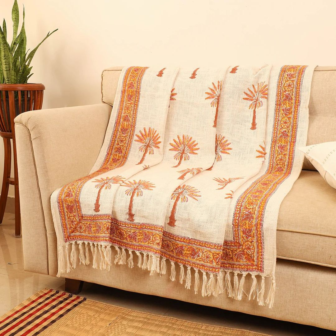 The patterned cotton material for a plain sofa like this is a great one! It makes the decoration not boring but not too crowded. 
